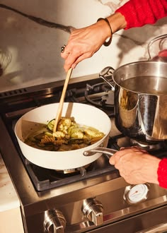 Stirring a pot on a home stovetop